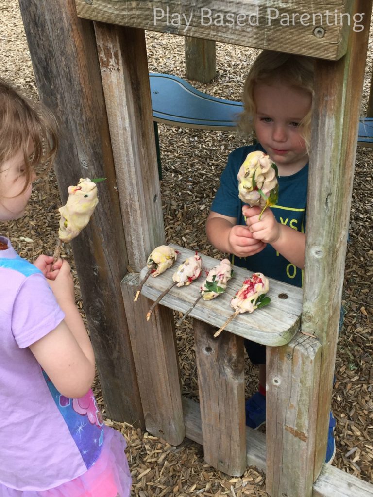 playing with nature and playdough outdoors